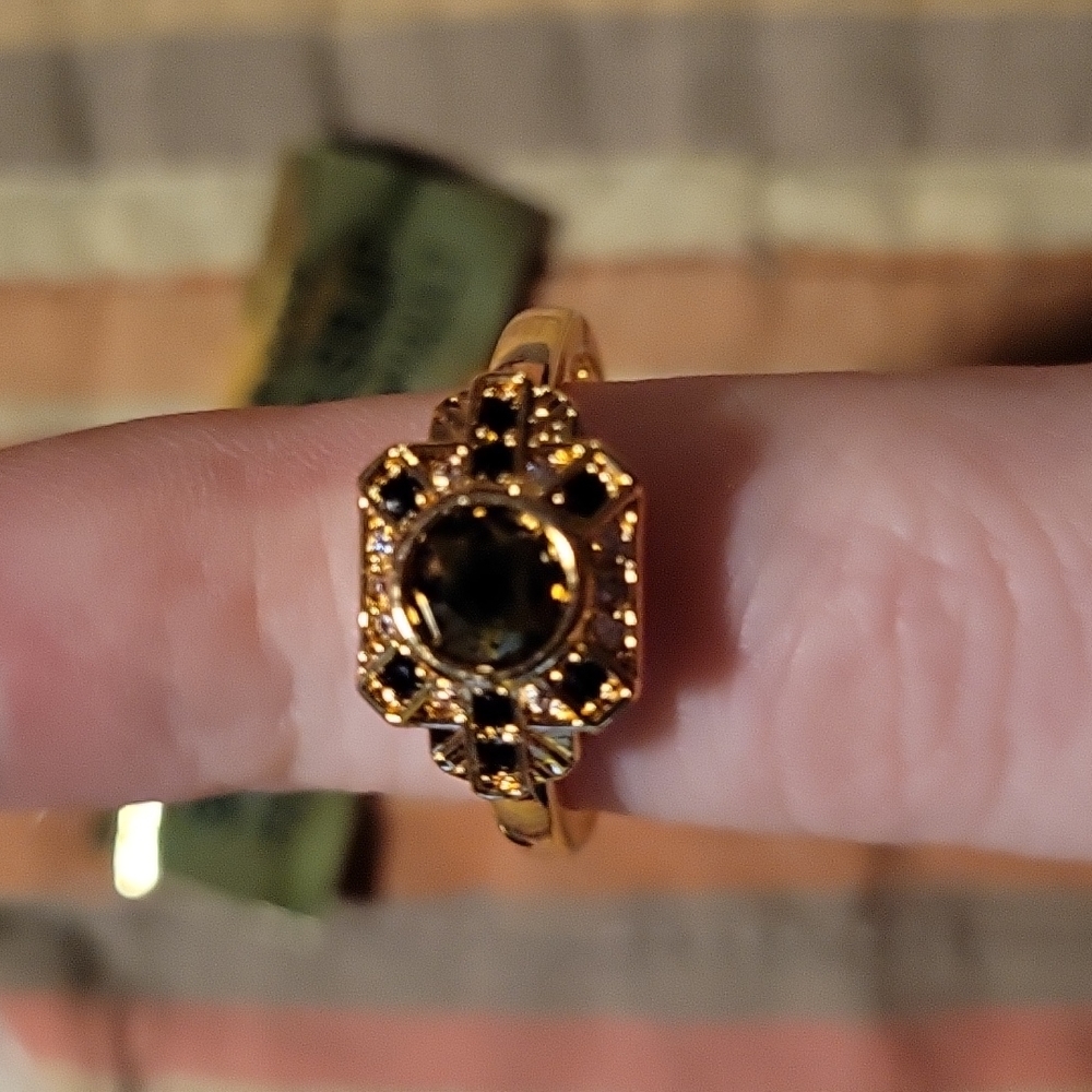 Gold and black ring
